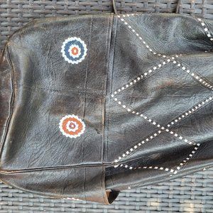 Vintage Moroccan leather black bucket drawstring bag with pockets and straps